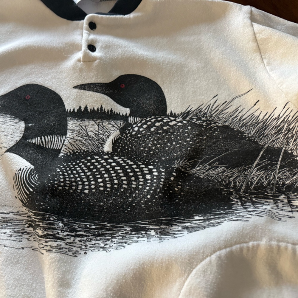 Vintage White Hoodie with Black Loon Graphic and Red Eye Accents